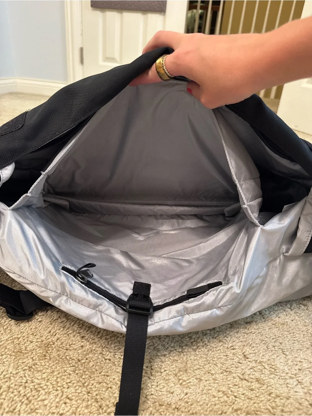 Patagonia Black Messenger Bag with Silver Reflective Strip